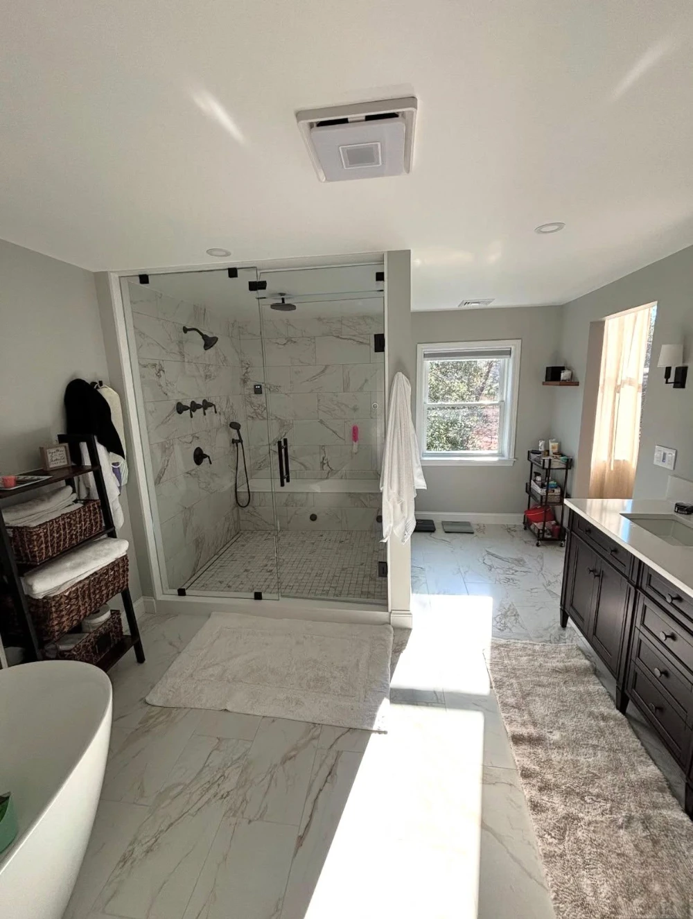 Completed master bathroom remodel with walk-in shower