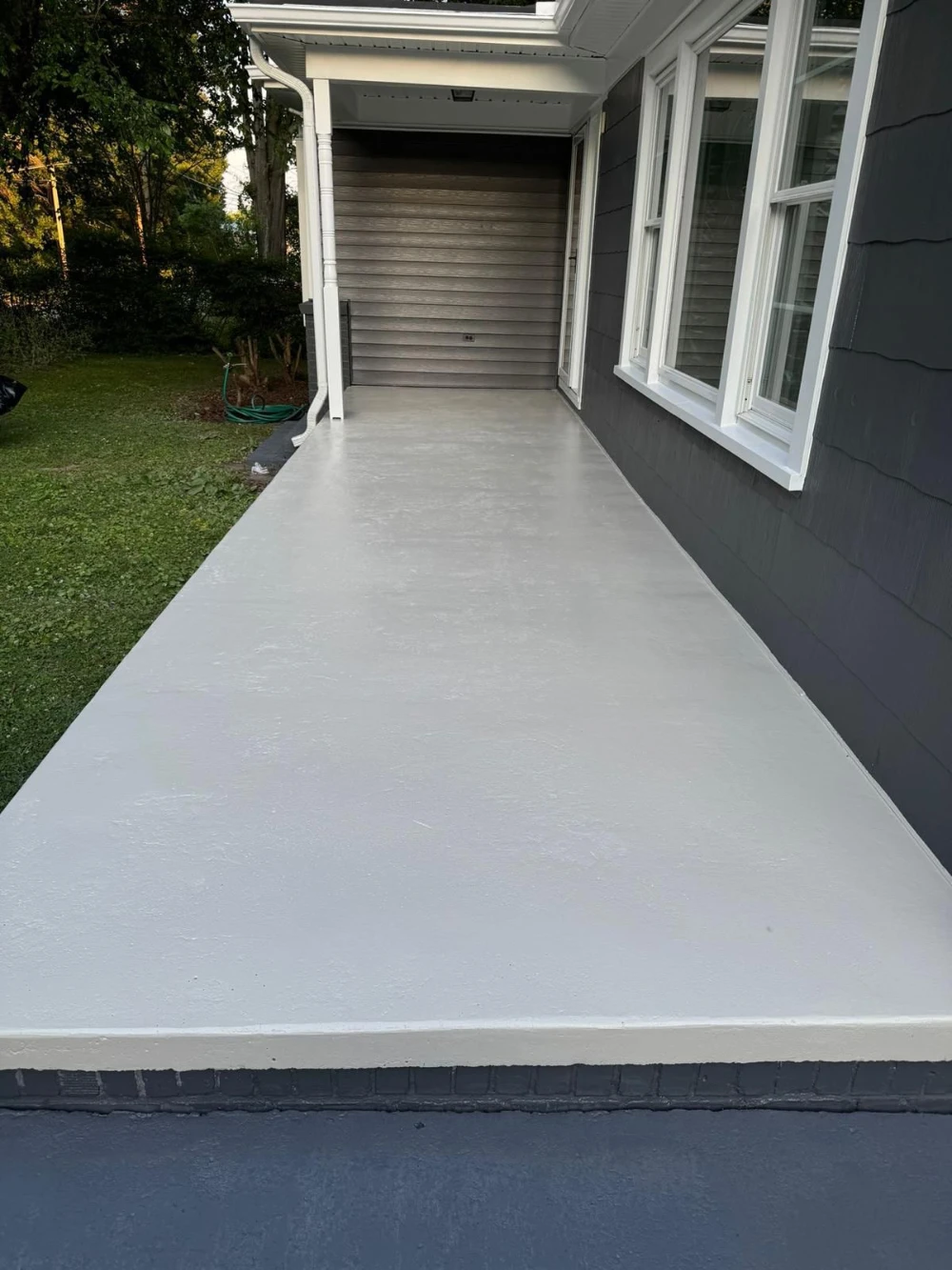 After — Side Walkway & Siding Refresh